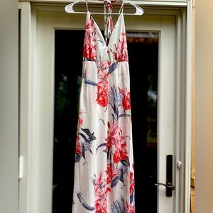 Floral Low back dress. NWT  never been worn. Size S